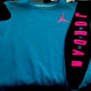 Blue and Black Air Jordan sweater.
